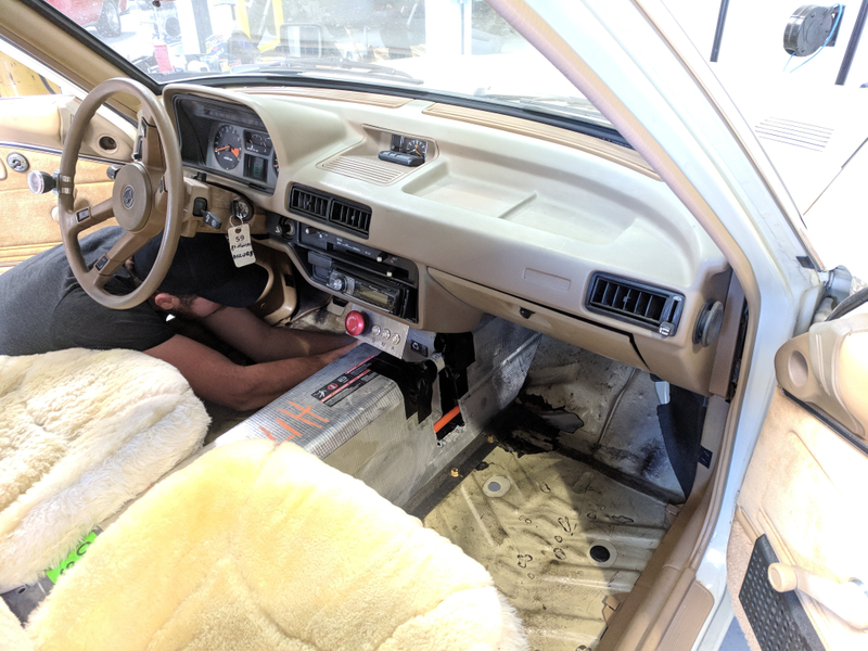 Shag-covered seats, now with a little extra battery in between.